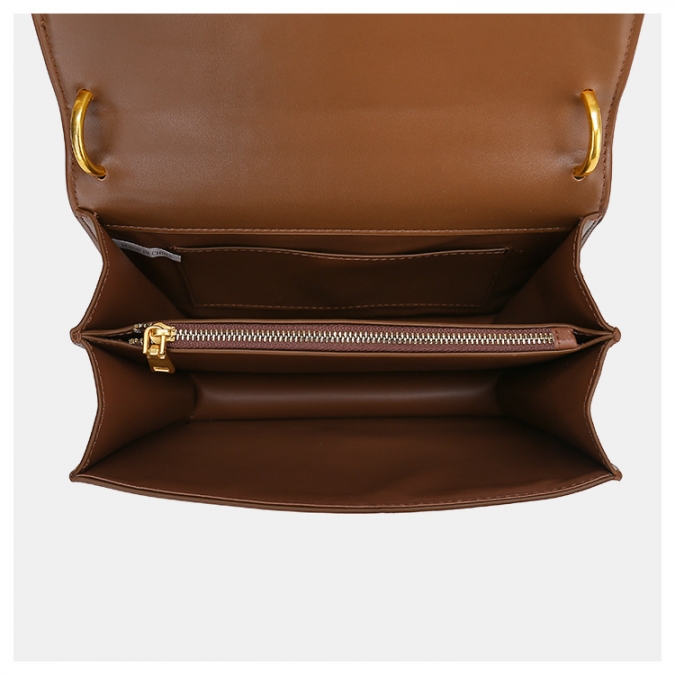 bolsos de marca americana bolso de mano de cuero liso con bolso de cierre metálico único 